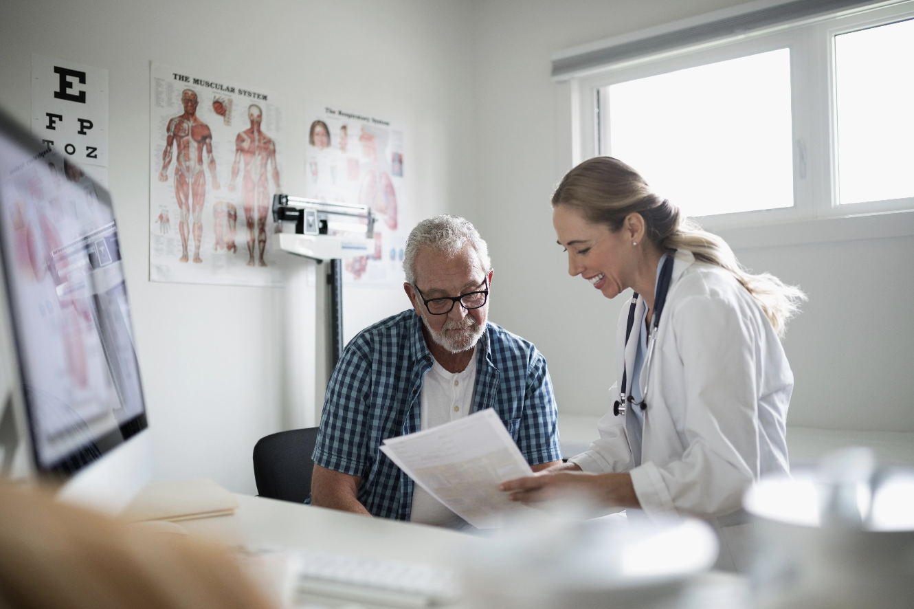 GP Assisting Patient